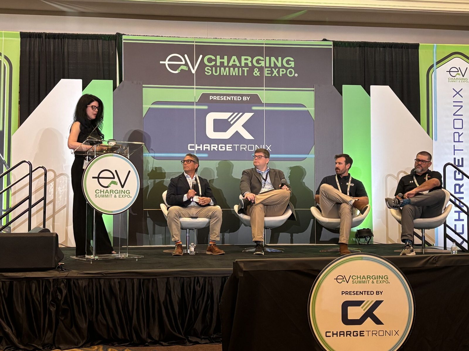 Sarah MacLean speaking on stage at the EV Charging Summit & Expo